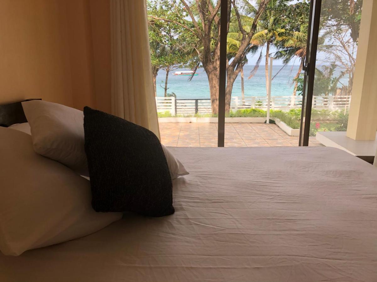 Amami Beachfront Villa With Private Beach Пуерто-Галера Екстер'єр фото